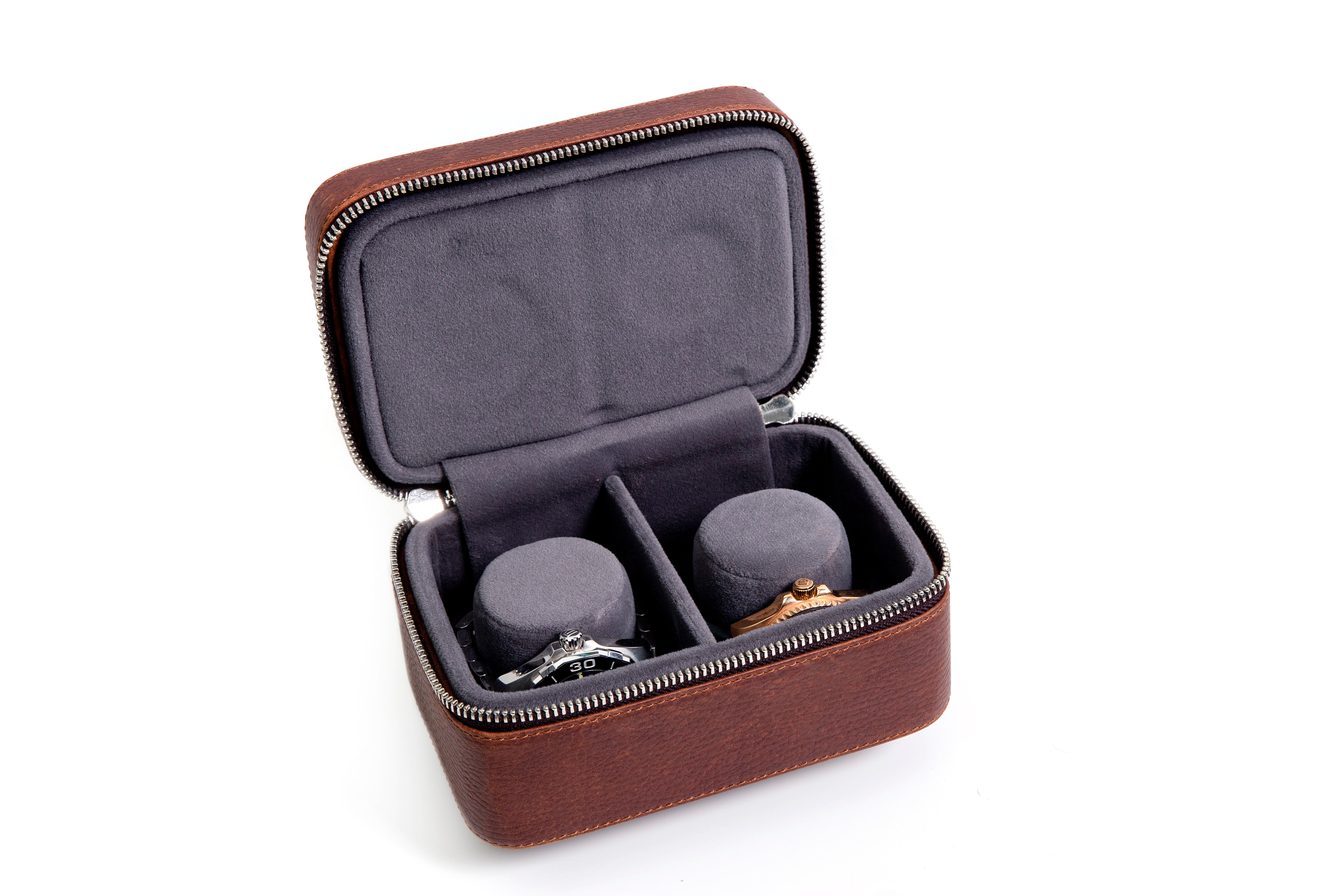 2 watches stored safely in the watch wallet. A leather travel case for watches